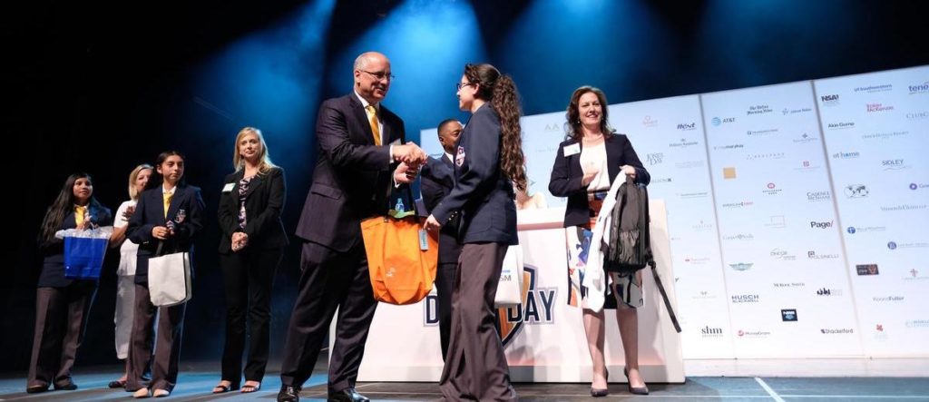 student greeted by CEO during Draft Day